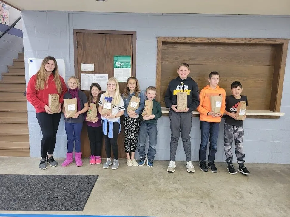 kids holding their brave bags